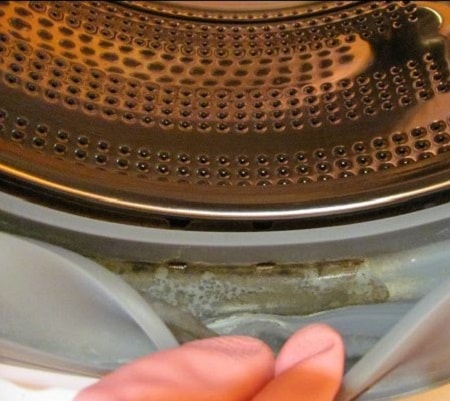 fjern mugg fra vaskemaskinen