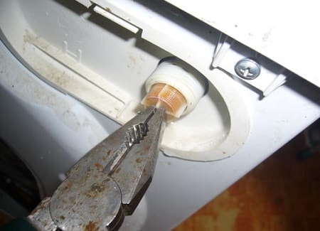 rengjøring av vaskemaskinens innløpsfilter